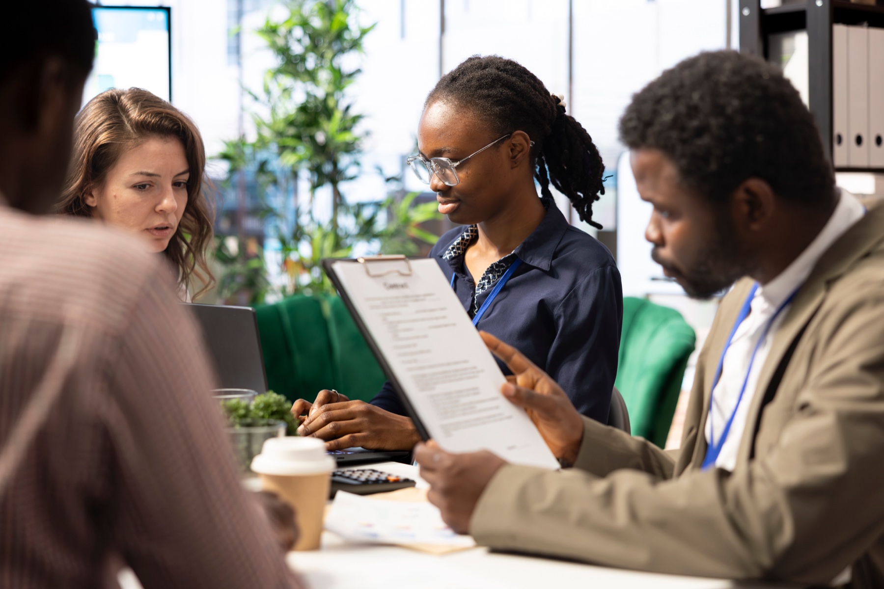 Professionals collaborating around a table